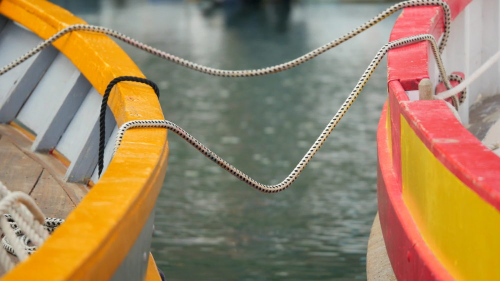 traditional-colorful-small-boat-close-up-on-rope-collioure-harbor-france-in-europe-video